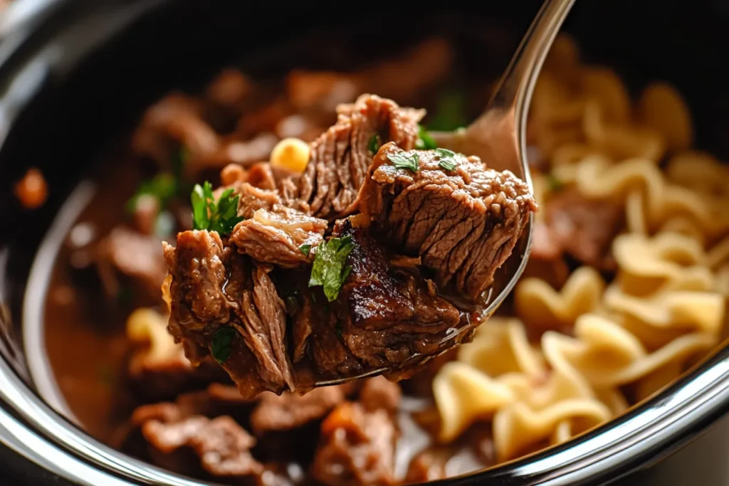  Spoonful of tender beef and noodles